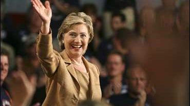 Democratic presidential hopeful, Sen. Hillary Rodham Clinton, D-N.Y., waves to supporters before her speech on the economy Monday, Oct. 8, 2007, in Cedar Rapids, Iowa. (AP Photo/Charlie Neibergall) 