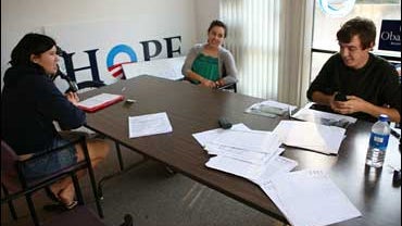 Obama campaign volunteers, from left to right, Johanna Turner, 21, of Urbandale, Iowa, Laurie King, 17, of Ames, Iowa, and Chris Elsenbast, of Ames, Iowa, work in the campagn office in Ames, Iowa, Wednesday, Oct. 3, 2007. 