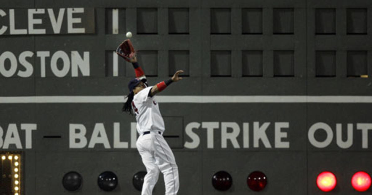 Cleveland Indians left fielder Kenny Lofton (7) and center fielder Grady  Sizemore celebrate after the Indians beat the Boston Red Sox, 4-2, in Game  3 of the American League Championship baseball series