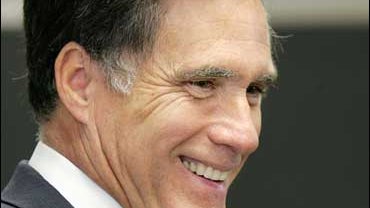 Republican presidential hopeful, former Massachusetts Gov. Mitt Romney laughs in response to a reporter's question during a news conference at the Ohio State University Airport in Columbus, Ohio, Wednesday, Oct. 17, 2007. (AP Photo/Paul Vernon) 