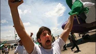 Demonstrators shout slogans at the Viru Viru international airport in Santa Cruz de la Sierra, Bolivia 