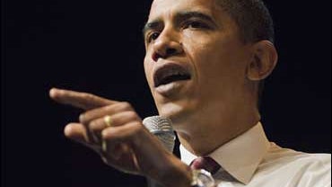 Presedential hopeful Sen. Barack Obama answers questions from the crowd gathered at the Grand Sierra Resort in Reno, NV, Thursday, Oct. 18, 2007, during a town hall style meeting. (AP Photo/Scott Sady) 