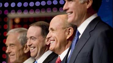 ORLANDO, FL - OCTOBER 21: The Republican presidential candidates, (L-R) U.S. Rep. Ron Paul (R-TX), former Arkansas governor Mike Huckabee, former New York City Mayor Rudy Giuliani, former Massachusetts governor Mitt Romney, stand on stage during the Repub 