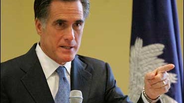 Republican presidential hopeful, Mitt Romney gestures as he fields questions during a campaign stop in Greenwood, S.C. Tuesday, Oct. 23, 2007. In the midst of criticizing Obama and other Democrats on foreign and economic policy Tuesday, the GOP presidenti 