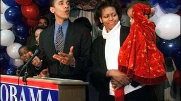 Barack Obama, left, with his wife, Michelle, and daughter, Malia, delivers his concession speech after losing the Democratic primary in Illinois' 1st Congressional District 