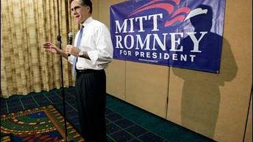 Former Massachusetts Gov. Mitt Romney speaks to reporters following a "Town Hall" meeting as the Republican presidential hopeful campaigns in Burbank, Calif., Thursday, Nov. 15, 2007. (AP Photo/Reed Saxon) 
