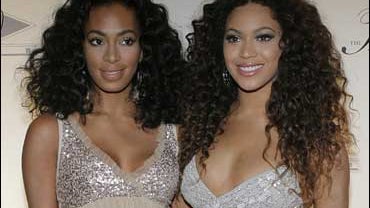 Beyonce, right, and her sister Solange 