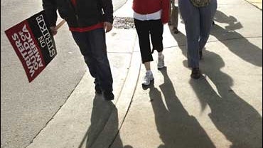 Striking film and television writers picket outside CBS Radford Studios, Los Angeles 