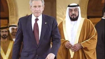 United Arab Emirates President Sheik Khalifa bin Zayed Al Nahyan watches as President George W. Bush leaves a meeting at Al Mushref Palace 
