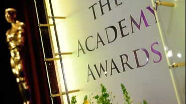 The Oscar statue and sign at Academy of Motion Picture Arts and Sciences after the nominations for the 80th annual Academy Awards in Beverly Hills, Calif., Tuesday morning, Jan. 22, 2008. (AP Photo/Chris Pizzello) 