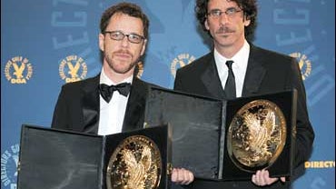 Directors Ethan Coen, left, and Joel Coen, pose with their DGA awards for "No Country for Old Men" 