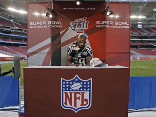 New England Patriots linebacker Junior Seau speaks to the media during  Media Day at the University of Phoenix Stadium in Glendale, Arizona, on  January 29, 2007. Super Bowl XLII will feature the