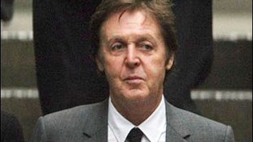 Paul McCartney arrives at the High Court in London 