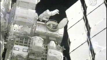 Michael Foreman exits the international space station 