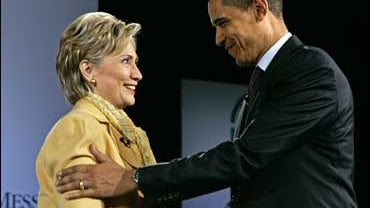 Sen. Hillary Rodham Clinton, D-N.Y., shakes hands with Sen. Barack Obama 