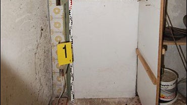 A photo taken by a forensic team and released by the Austrian police with permission of Austria's prosecution office on Monday, April 28, 2008 shows a view into a hidden room in a house in Amstetten, Austria, in which a woman is believed to have been held 