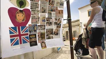 Billboards with images of missing British girl Madeleine McCann are seen Saturday May 3, 2008 at Praia da Luz beach, Lagos, Portugal 