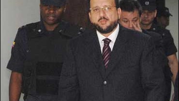 Former paramilitary leader Carlos Mario Jimenez arrives for a court hearing in Medellin, Colombia 