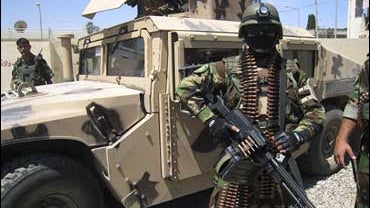 Iraqi soldiers stand guard in Mosul, Iraq 