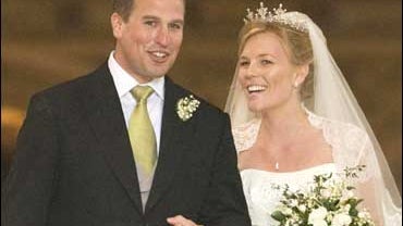 Peter Phillips, the eldest grandson of Queen Elizabeth II and Canadian Autumn Kelly leave St. George's Chapel in Windsor 