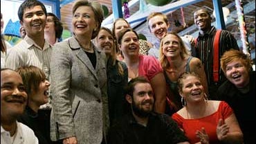 Hillary Rodham Clinton poses with staff members 