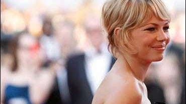 Actress Michelle Williams arrives for the premiere of the film "Synecdoche, New York" at the 61st International film festival in Cannes, southern France, on Friday, May 23, 2008. 