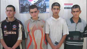 Four of six Iraqi teenage boys purportedly being trained as suicide bombers 