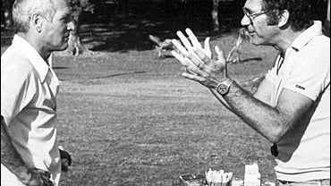 director Sydney Pollack, right, directs actor Paul Newman through a scene from Absence of Malice 