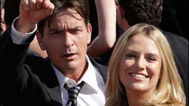 Actor Charlie Sheen and Brooke Mueller arrive at the 59th Primetime Emmy Awards Sunday, Sept. 16, 2007, at the Shrine Auditorium in Los Angeles. Charlie Sheen tied the knot with fianc 