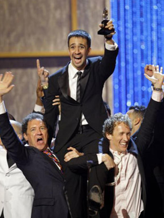 Lin-Manuel Miranda, center, is hoisted up on stage after "In The Heights" won the award for best musical during the 62nd Annual Tony Awards in New York, Sunday, June 15, 2008. 
