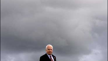 Republican presidential candidate Sen. John McCain, R-Ariz., turns and looks around as he boards his campaign jet before leaving Ottawa 