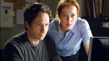 In this image released by 20th Century Fox, David Duchovny, left, and Gillian Anderson are shown in a scene from, "The X-Files: I Want to Believe." (AP Photo/20th Century Fox, Diyah Pera) 
