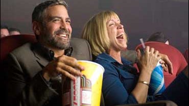 George Clooney and Frances McDormand in a scene from "Burn After Reading." 