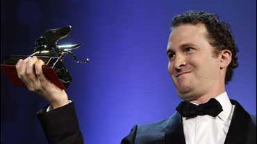 Director Darren Aronofsky holds aloft the Golden Lion award for his film "The Wrestler" during the awards presentation at the 65th edition of the Venice Film Festival 