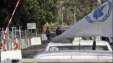 A United Nations convoy with humanitarian aid, seen at a Russian checkpoint at Karaleti 