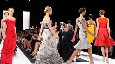 Models walk the finale of the spring 2009 collection of Carolina Herrera during Fashion Week in New York, Monday Sept. 8, 2008. 
