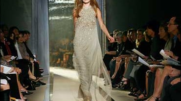 A model wears fashion from the Donna Karan spring/summer 2009 collection as part of Fashion Week in New York, Friday, Sept. 12, 2008. 