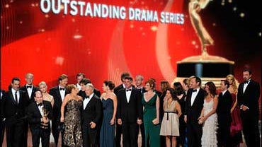 Producer Matthew Weiner, along with cast and crew, accept the award for the outstanding drama series "Mad Men" at the 60th Primetime Emmy Awards Sunday, Sept. 21, 2008, in Los Angeles. 
