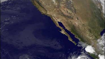 This image provided by NOAA taken at midnight Wednesday morning Oct. 8, 2008 shows Hurricane Norbert south of Mexico's Baja peninsula. 