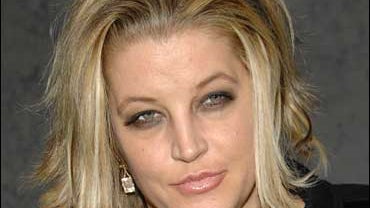 This Dec. 6, 2007, file photo file photo shows Lisa Marie Presley in New York. A publicist says the 40-year-old singer gave birth to twin girls, whose names were not released. 
