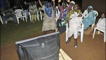 Extended family members of U.S. Presidential elect Barack Obama react as election results come in, at the family's homestead in Kogelo village, Kenya on Nov. 5, 2008. 