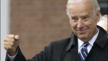 Joe Biden gestures during Return Day parade 