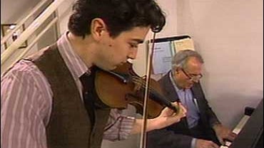 Seventeen-year-old violin prodigy Jourdan Urbach, with Charles Osgood 