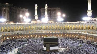 Muslim pilgrims circle the Kaaba inside the Grand mosque in Mecca 