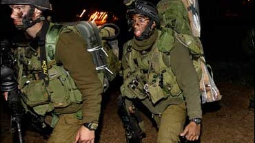 Israeli soldiers prepare to enter Gaza 