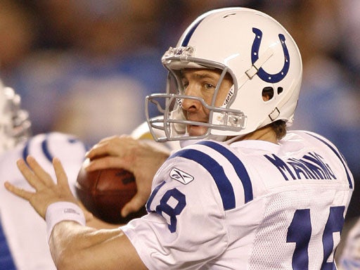 Peyton Manning throws a pass  