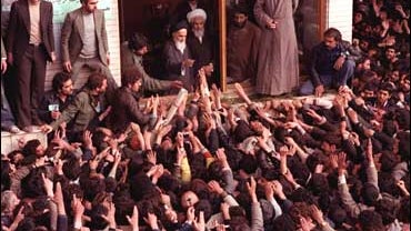 Ayatollah Ruhollah Khomeini, center, is greeted by supporters after arriving at the airport in Tehran Iran in this Feb. 1, 1979 photo 