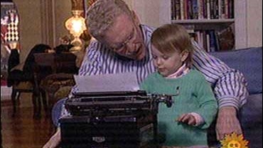 Bill Geist introduces his granddaughter Lucie to an ancient form of computer. 