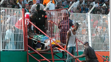 Injured man getting carried out of stands 