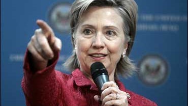 Secretary of State Hillary Rodham Clinton gestures as she addresses representatives of Iraqi civil society and members of the press core at a meeting at the U.S. embassy in Baghdad 